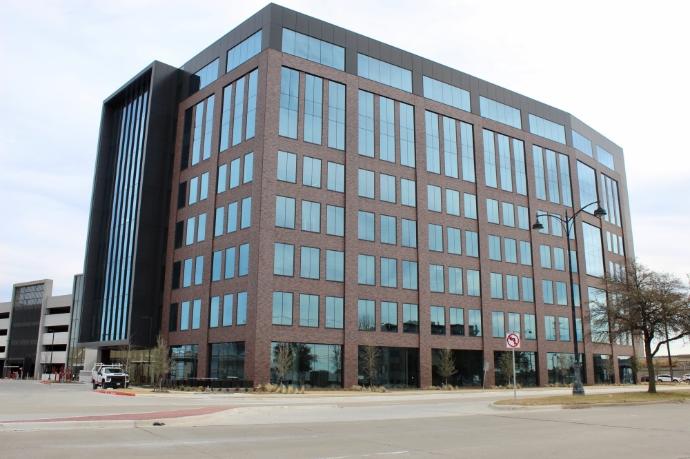 The McKinney Economic Development Corp.'s offices are located in the 200,000-square-foot Class A office building developed by Kaizen Development Partners in District 121. (Shelbie Hamilton/Community Impact)