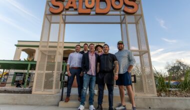 From left, Israel Trevino, owner; Daniel Trevino, owner; Allen Shy, owner; Caroline Garcia-Bowman, interior designer/brand strategist; Edward Garcia III, owner/executive chef; and Cody Reimer, owner. (Ethan Thomas/Community Impact)