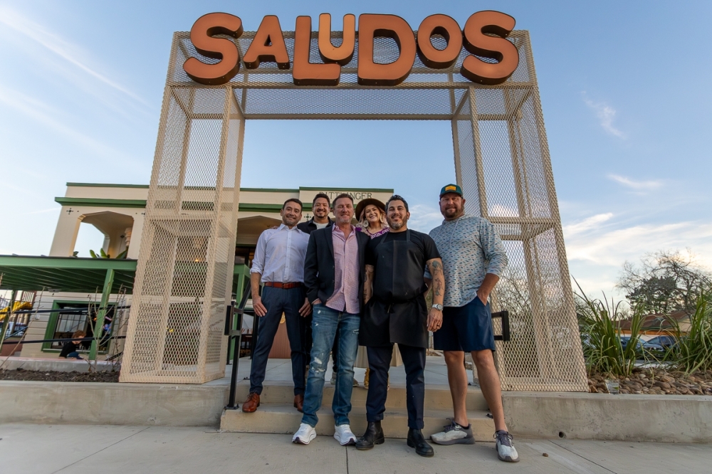 From left, Israel Trevino, owner; Daniel Trevino, owner; Allen Shy, owner; Caroline Garcia-Bowman, interior designer/brand strategist; Edward Garcia III, owner/executive chef; and Cody Reimer, owner. (Ethan Thomas/Community Impact)