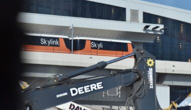 A Skylink train drives over a construction area near Terminal C at Dallas Fort Worth International Airport. (Cody Thorn/Community Impact)
