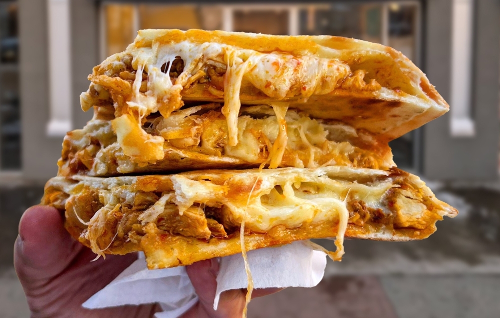 Cloud Naan serves up both traditional and fusion flavors of stuffed naan, including creamy tikka naan. (Courtesy Cloud Naan)