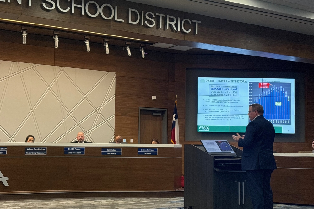 Brent Alexander, demographics research director at School District Strategies, speaks during an Allen ISD board of trustees meeting.