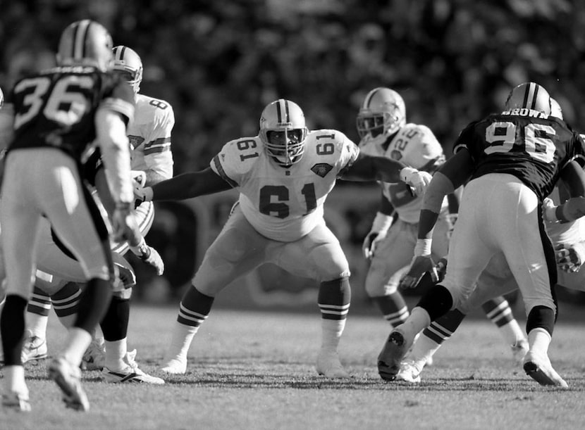 Nate Newton protects the line during a game against the 49ers game in 1994.