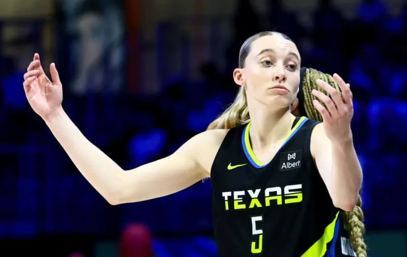 Aug 24, 2025; Arlington, Texas, USA; Dallas Wings guard Paige Bueckers (5) reacts against the Golden State Valkyries during the second half at College Park Center. Mandatory Credit: Kevin Jairaj-Imagn Images