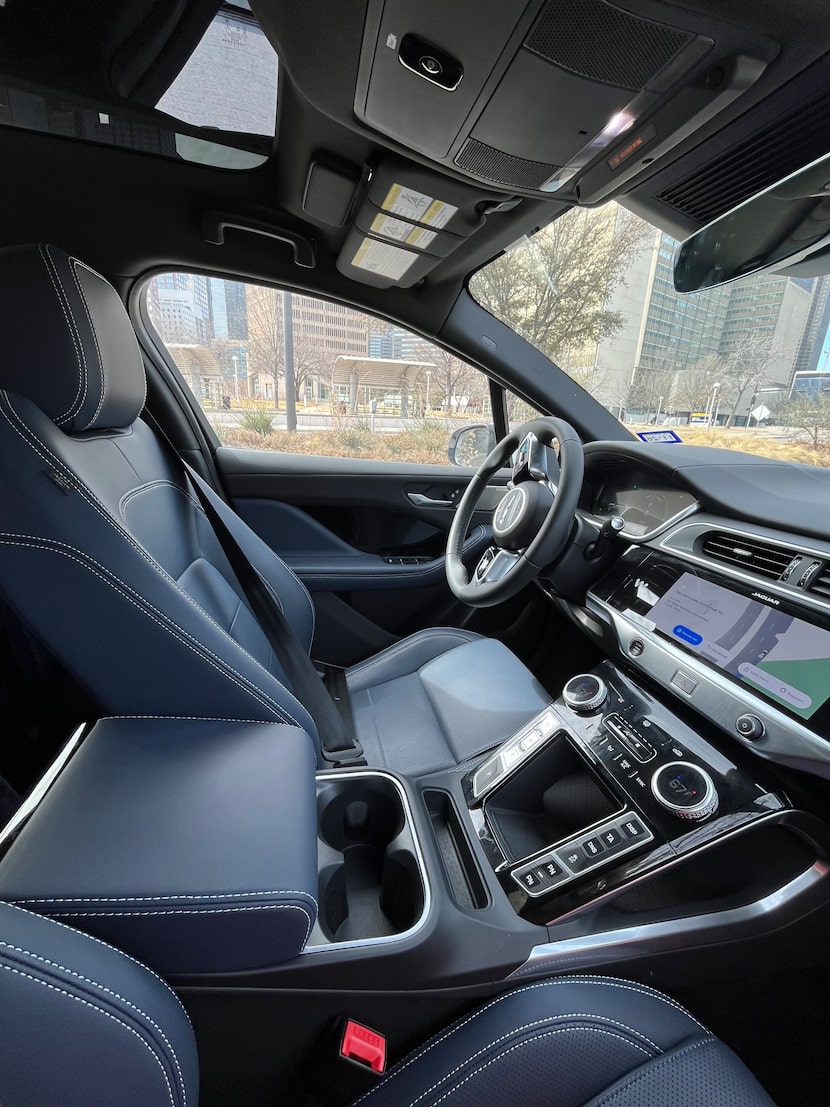 The empty driver seat of a Waymo robotaxi is shown during a preview ride for members of the...