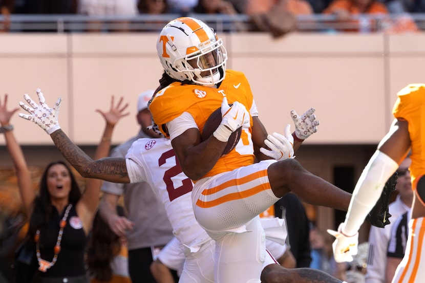 Tennessee defensive back Jermod McCoy (3) intercepts a pass in the end zone during the first...