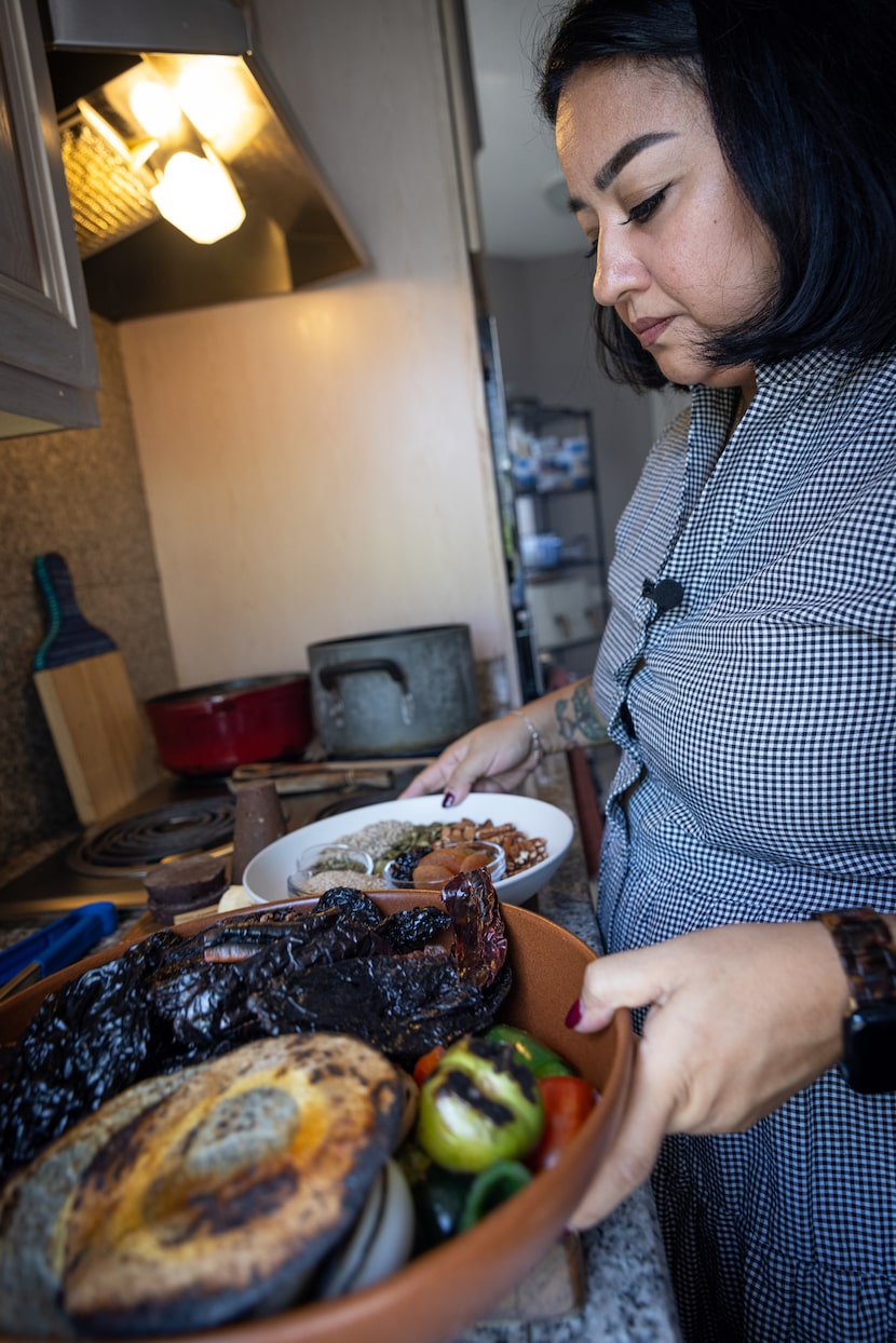 Chef Anastacia Quiñones-Pittman prepares many ingredients including nuts, fruits and...