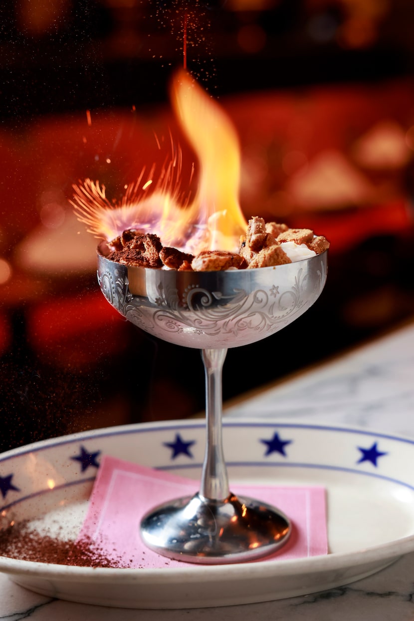 Flaming semifreddo affogato brings some drama to The Charles' dining room.