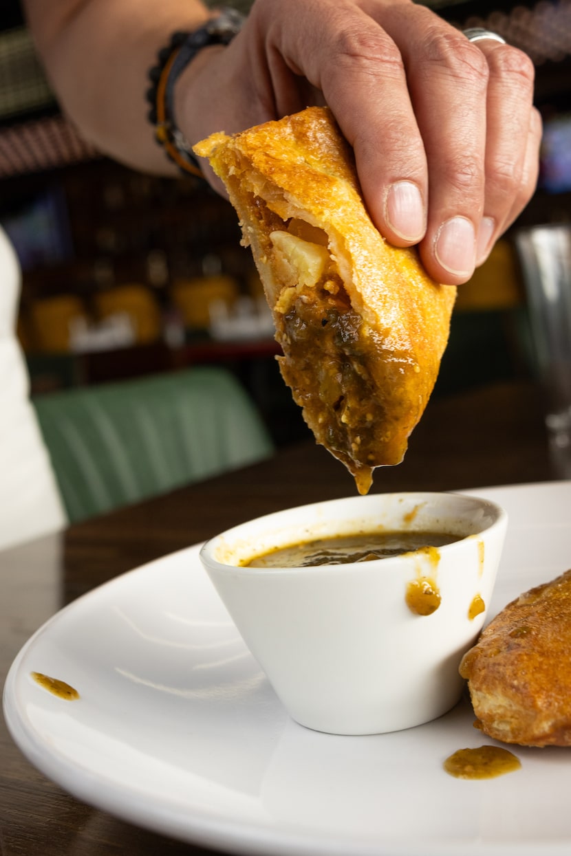 The breakfast empanada at AM/FM has chorizo, potato, egg and cheddar cheese.