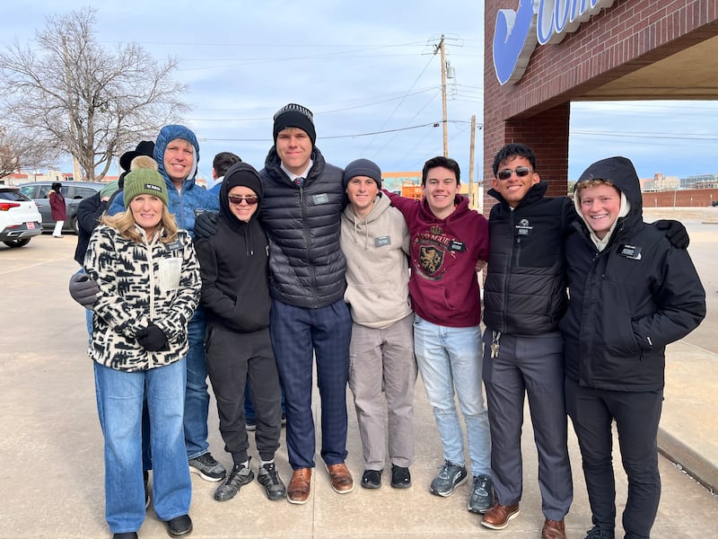 Missionaries smile while volunteering at the Martin Luther King Jr. Day parade on Saturday Jan. 19, 2025 in Oklahoma City, Oklahoma.