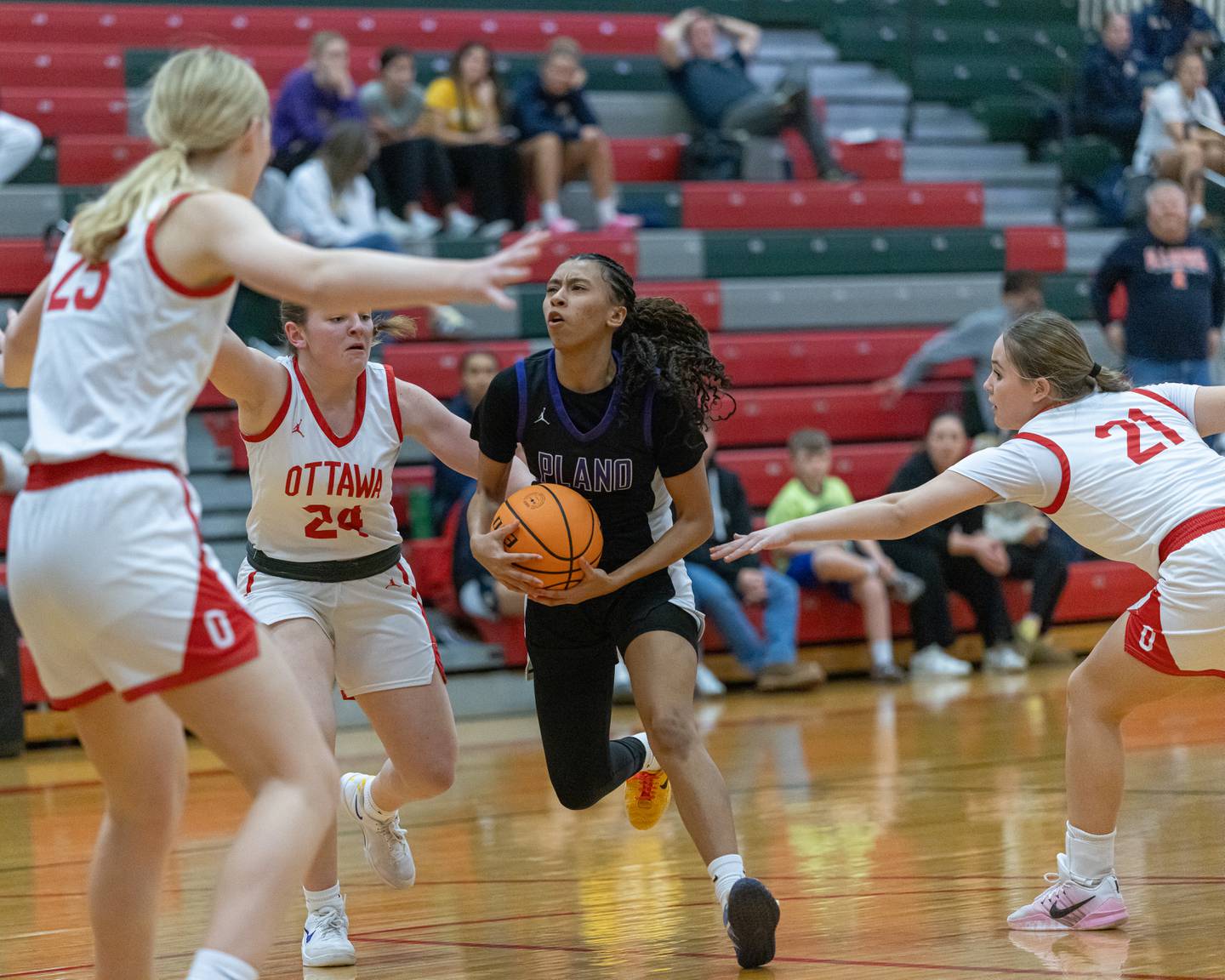 Niya Viser of Plano dribbles through Ottawa High School defense during the IHSA Class 3A Girls Basketball Regionals in Sellett Gym on February 16, 2026 at LaSalle-Peru High School.