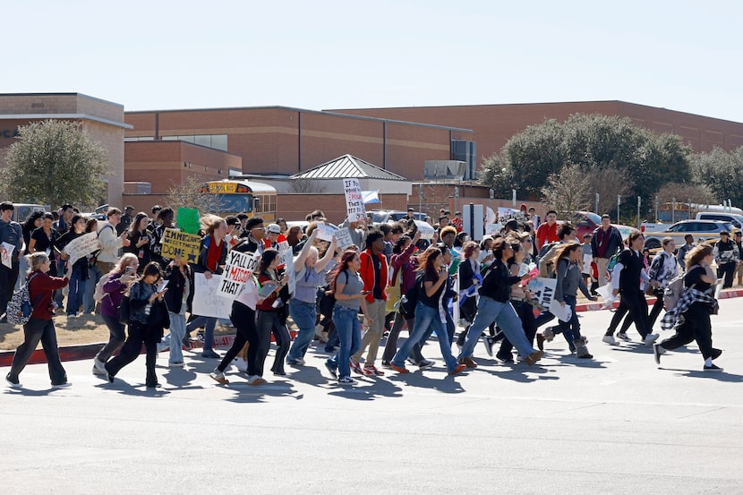 High School students walk out of Forney High School over immigration policy, Thursday, Feb....