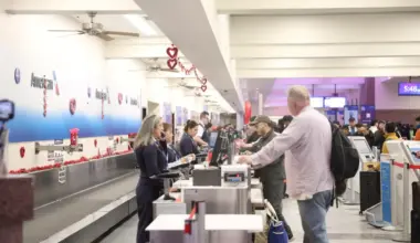 Passengers at the El Paso International Airport check on the status of their flights amid a temporary flight restriction for El Paso airspace. The TFR will last for 10 days, according to a notice from the Federal Aviation Administration.
