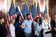 Epstein survivors and the family of Virginia Giuffre attend a press conference to introduce...