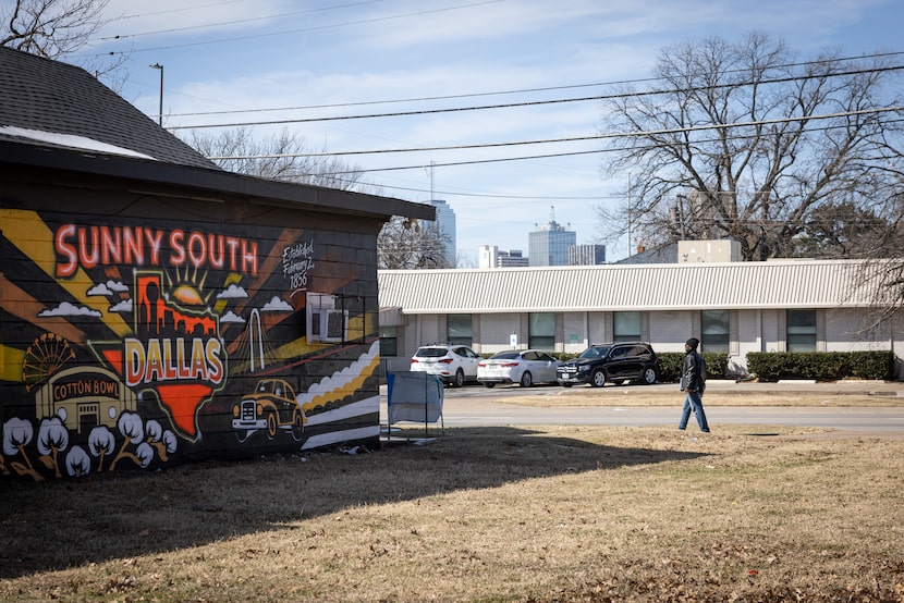 The finished mural on a building in South Dallas by artist Theo Ponchaveli with the help of...