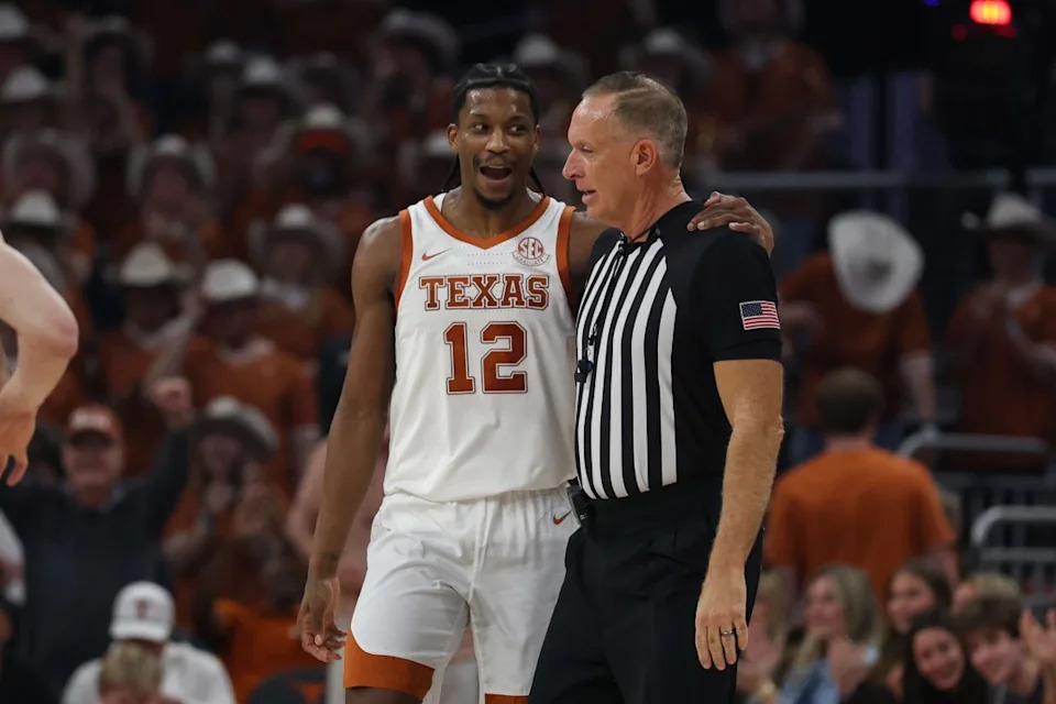 AUSTIN, TX – FEBRUARY 07: Guard Tramon Mark #12 of the Texas Longhorns puts his arm around the referee as he talks to him during a timeout of the SEC college basketball game between Texas Longhorns and Ole Miss Rebels on February 7, 2026, at Moody Center in Austin, TX. (Photo by David Buono/Icon Sportswire via Getty Images)