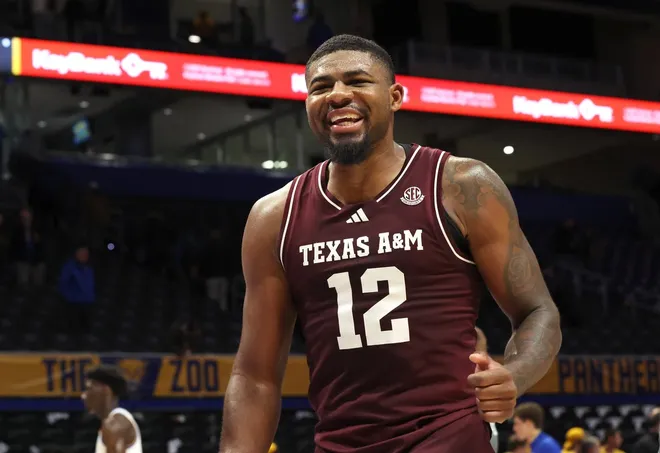 Dec 2, 2025; Pittsburgh, Pennsylvania, USA; Texas A&M Aggies forward Rashaun Agee (12) reacts after defeating the Pittsburgh Panthers at the Petersen Events Center.