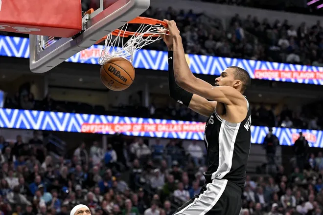 Feb 5, 2026; Dallas, Texas, USA; San Antonio Spurs forward Victor Wembanyama (1) dunks the ball during the second half against the San Antonio Spurs at the American Airlines Center.