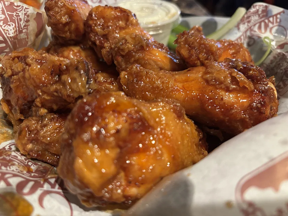 Track One's Double Dip wings are among the most popular wing choices at the restaurant. They expect to sell 200 or more orders of wings for Super Bowl 60.