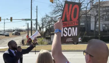 American Airlines flight attendants hold protest calling for CEO Robert Isom to step down