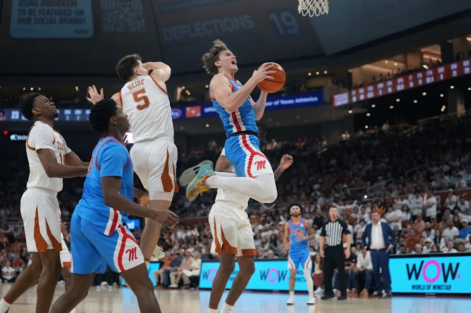 AUSTIN, TEXAS – FEBRUARY 7: Eduardo Klafke #8 of the Ole Miss Rebels drives to the basket past Camden Heide #5 and Nic Codie #10 of the Texas Longhorns during the second half at Moody Center on February 7, 2026 in Austin, Texas. (Photo by Scott Wachter/Getty Images)