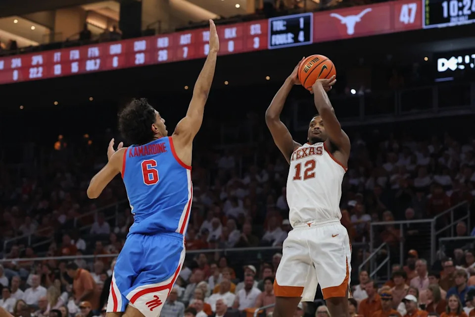 AUSTIN, TX – FEBRUARY 07: Guard Tramon Mark #12 of the Texas Longhorns takes a three point shot over guard Ilias Kamardine #6 of the Ole Miss Rebels during the SEC college basketball game between Texas Longhorns and Ole Miss Rebels on February 7, 2026, at Moody Center in Austin, TX. (Photo by David Buono/Icon Sportswire via Getty Images)