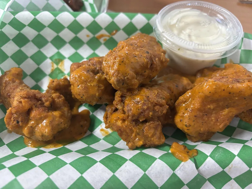 Like some heat? Try the Buffalo Hot wings at Monster Wings, at N. Lee Trevino. They are covered in spicy but delicious sauce. Ask for extra napkins.