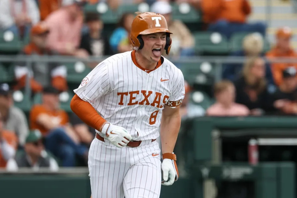 AUSTIN, TX – FEBRUARY 21: Catcher Carson Tinney #8 of the Texas Longhorns holds his tongue out as he runs to first after getting a hit during the college baseball game between Texas Longhorns and Michigan State Spartans on February 21, 2026, at UFCU Disch-Falk Field in Austin, TX. (Photo by David Buono/Icon Sportswire via Getty Images)