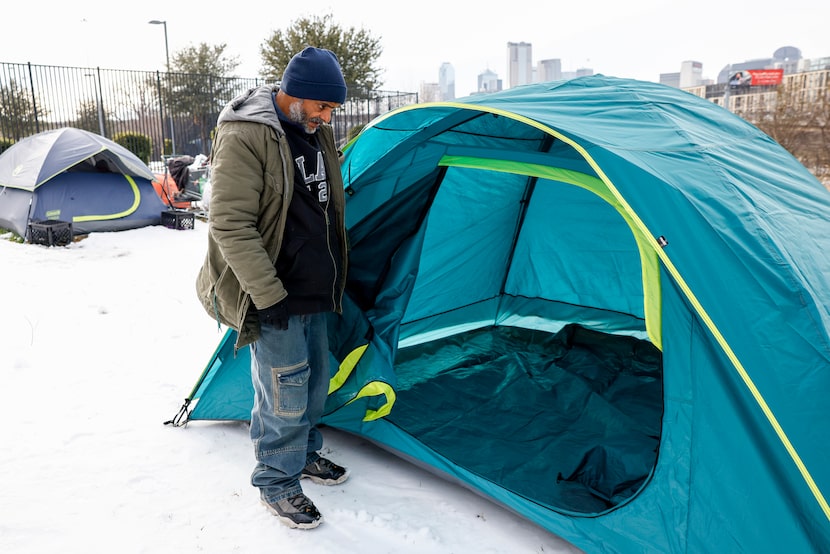Homeless Dallas resident Victor Howard checks out his new tent given to him by nonprofit The...