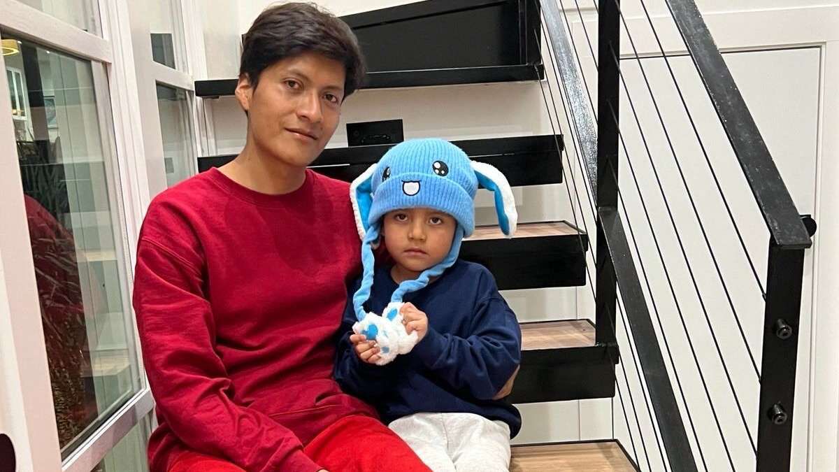 In this photo released by U.S. Rep. Joaquin Castro, D-TX, Adrian Conejo Arias and his son, five-year-old Liam Conejo Ramos are seen in San Antonio, Texas, Saturday, Jan. 31, 2026, after being released from Dilley detention center. (Joaquin Castro via AP)