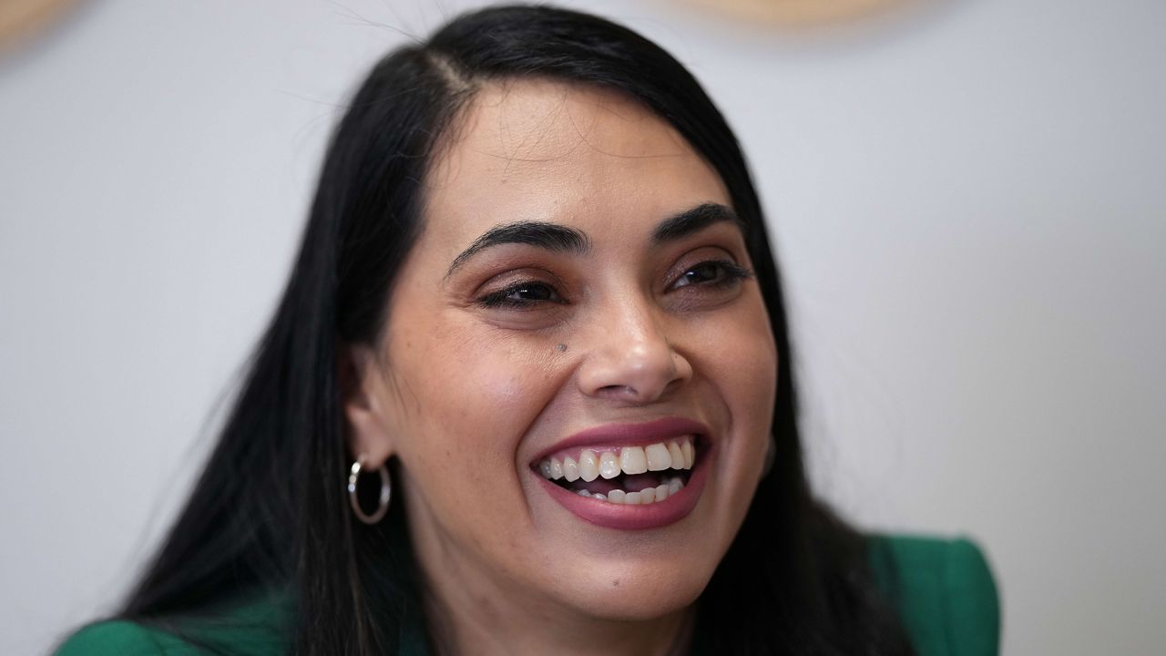 Rep. Mayra Flores, R-Texas, left, visits at a coffee shop, in Corpus Christi, Texas, Wednesday, Feb. 11, 2026. (AP Photo/Eric Gay)