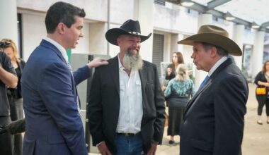 Forrest Welborn, middle, arrives with his attorneys at the exoneration hearing for four men wrongfully accused in the 1991 Austin yogurt shop murders at the Blackwell-Thurman Criminal Justice Center in Austin on Thursday, Feb. 19, 2026. (Jay Janner/Austin American-Statesman via AP)