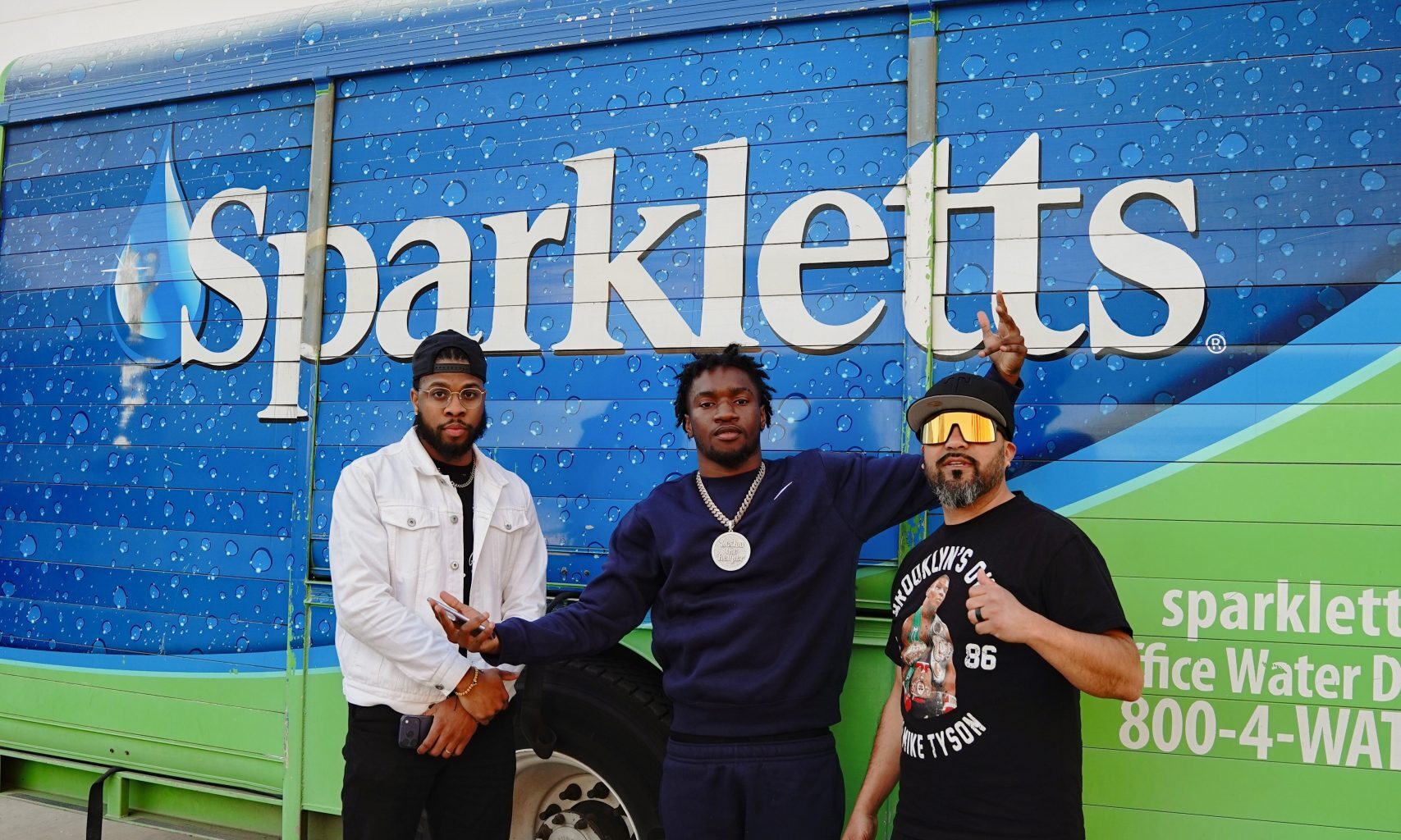 Pro boxer Alex Holley partners with Arlington Urban to donate over 5,600 bottles of water to Mission Arlington ahead of February 27 Fight at UTA 