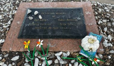 Tributes lay on a memorial Sept. 26, 2025, for four teenage girls who were killed in a yogurt shop in 1991 in Austin, Texas. (AP Photo/Paul J. Weber, File)