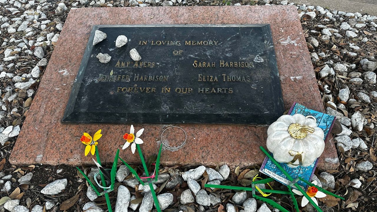 Tributes lay on a memorial Sept. 26, 2025, for four teenage girls who were killed in a yogurt shop in 1991 in Austin, Texas. (AP Photo/Paul J. Weber, File)