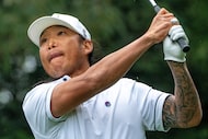 Wild Card player, Anthony Kim hits his shot from the fifth tee during the second round of...