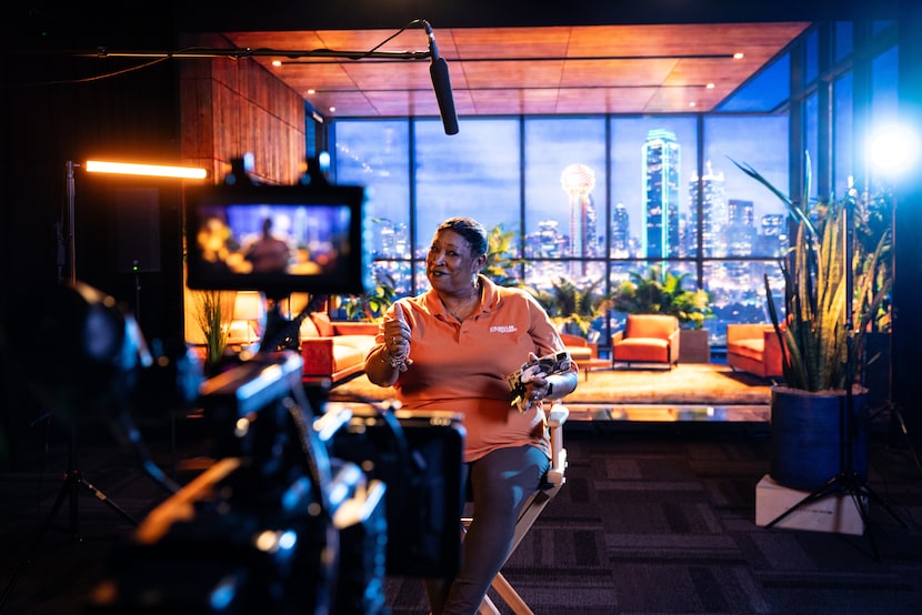 Dallas College North Lake Campus Information Center Manager Rosailand Patterson tests out a...