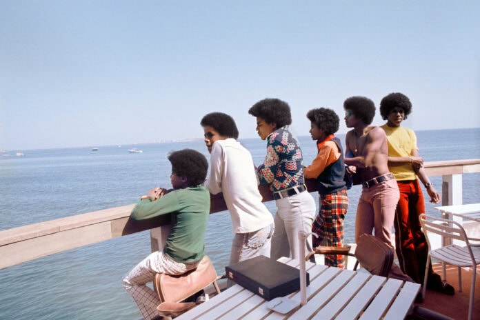 The Jackson Five on boat from Black Photojournalism exhibition