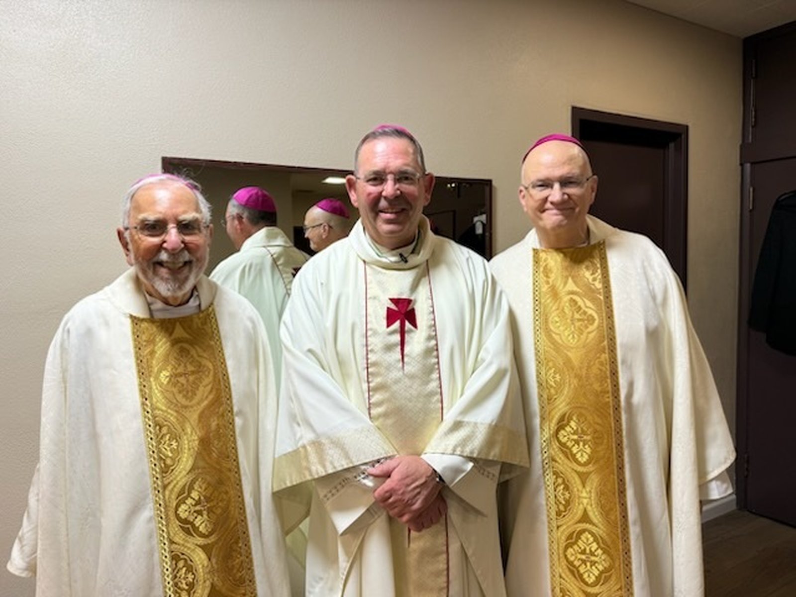 The sixth, seventh and eighth bishops of the Diocese of Tucson, Arizona, pose for a photograph before the installation of Bishop James A. Misko at St. Augustine Cathedral in Tucson: Bishop Gerald F. Kicanas, left (sixth), Archbishop Edward J. Weisenburger, right (seventh), and Bishop Misko, center (eighth).