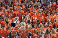 The Frisco Wakeland students cheer on their Wolverines against Frisco Lone Star in a...