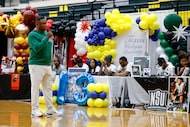 DeSoto head football coach Claude Mathis speaks to players and their parents during National...