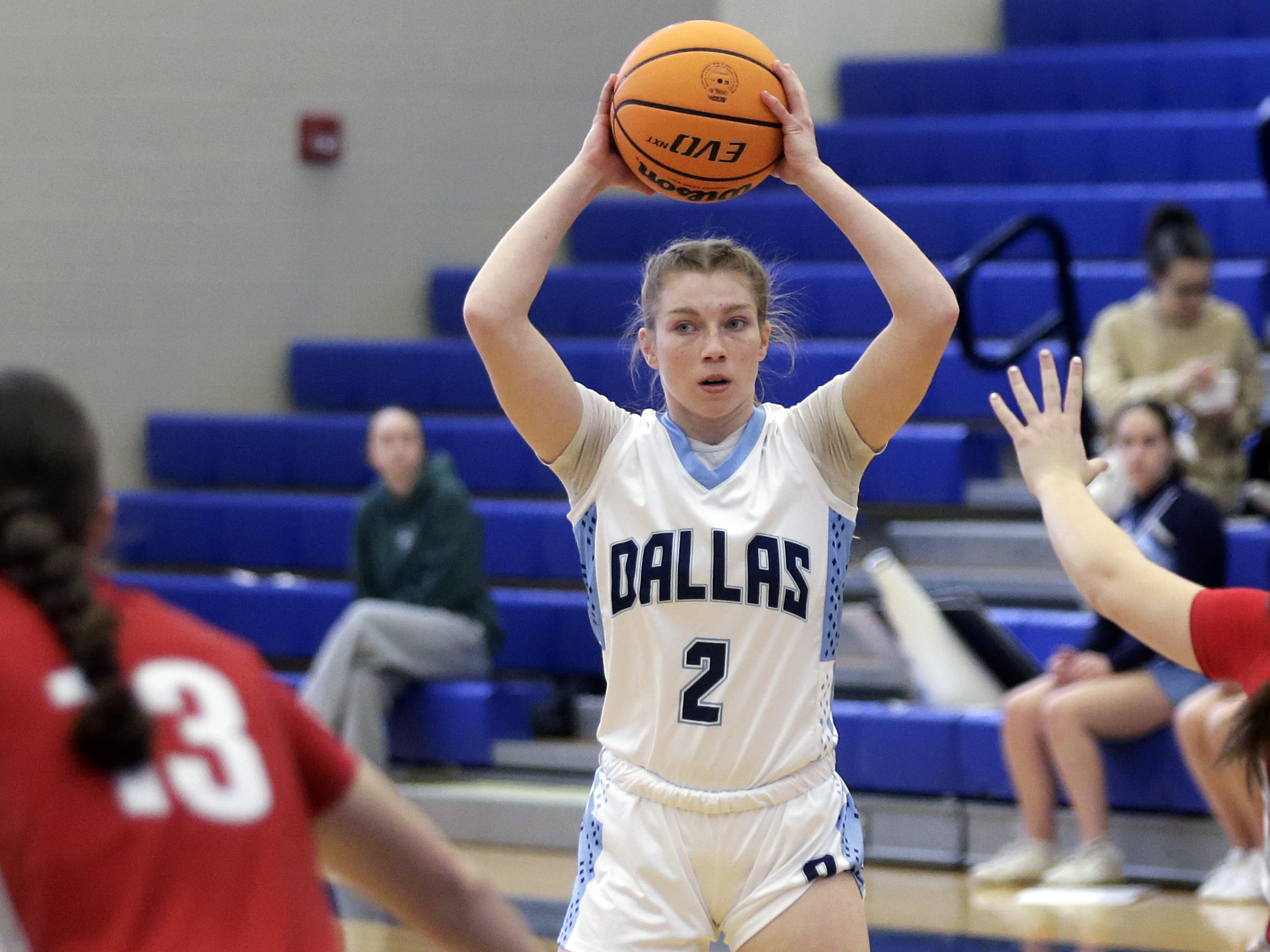 Dallas’ Caitlyn Mizzer (2) looks to pass against the North...