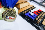 TAPPS medals and plaques during the TAPPS Division I state swim meet at the Mansfield ISD...