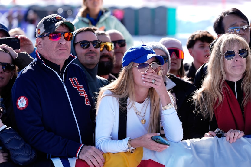 Spectators react after United States' Lindsey Vonn crashed during an alpine ski women's...