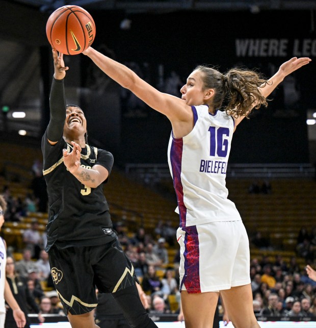 BOULDER , CO - FEBRUARY 8: Desiree Wooten (3) of the Colorado Buffaloes drives on Clara Bielefeld (16) of the TCU Horned Frogs during the fourth quarter of the Buffs' 80-79 win at the CU Events Center in Boulder, Colorado on Sunday, February 8, 2026. (Photo by AAron Ontiveroz/The Denver Post)