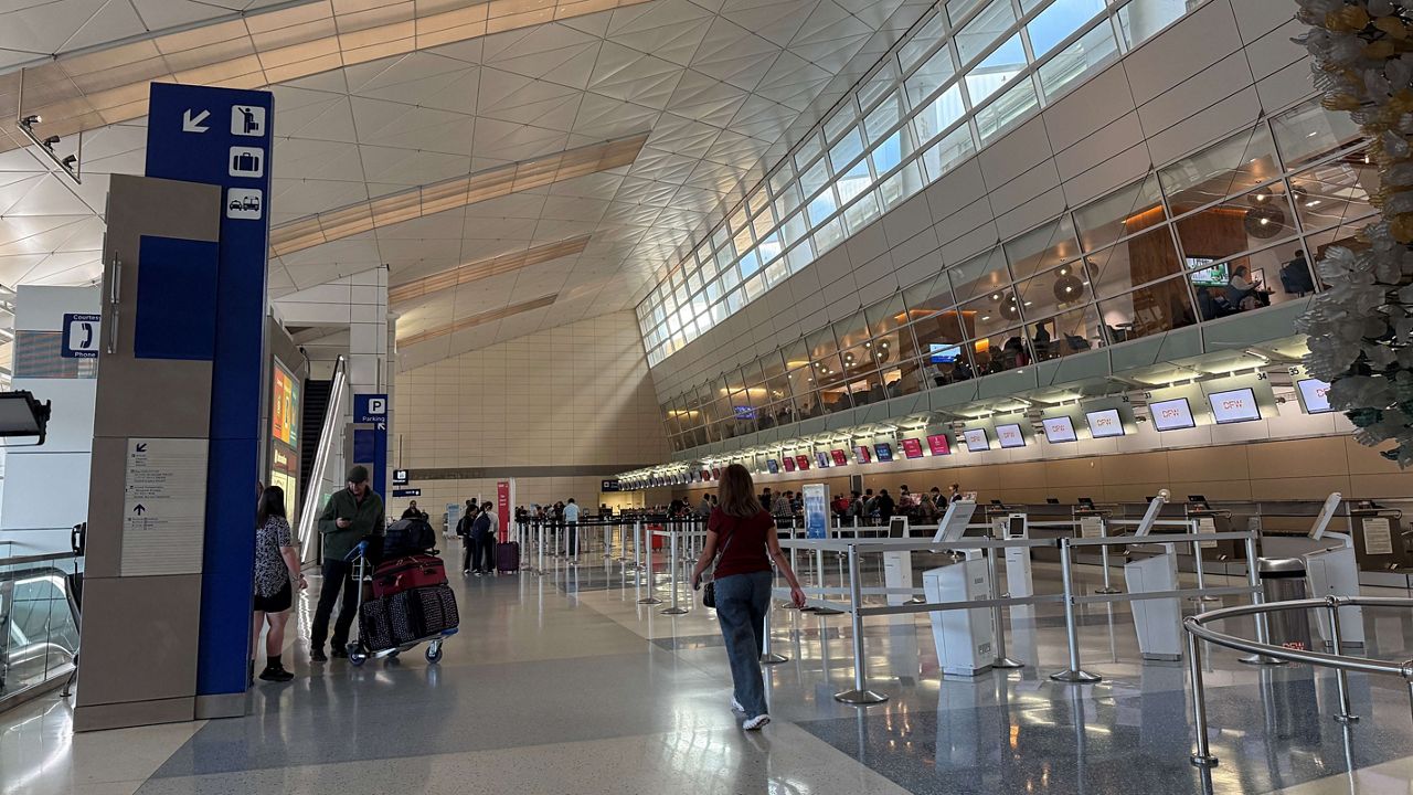 Check-in counters at Dallas-Fort Worth International Airport on Monday, Nov. 17, 2025. (Spectrum News 1/Lauren Rangel)