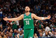 Dallas Mavericks guard Klay Thompson (31) gestures after scoring a three-point shot during...