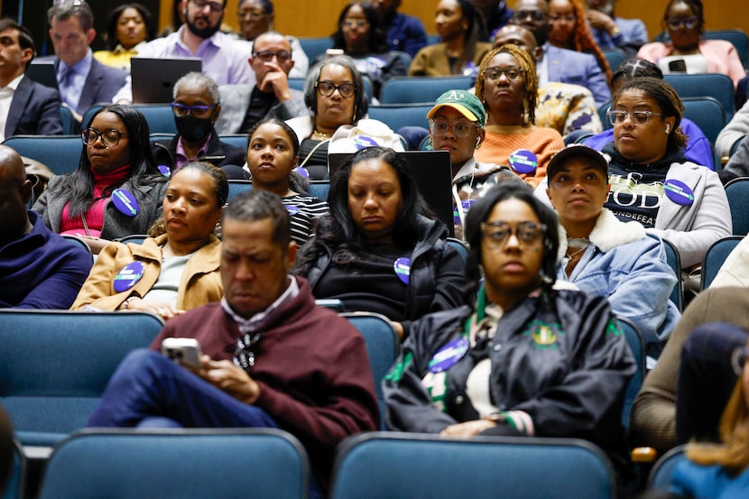 Members of Concord Church wear “Connect the Core” buttons during a Dallas City Council...