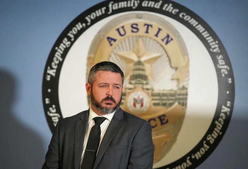 Austin police homicide detective Robert Marshall speaks during a news conference at APD...