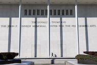 A woman walks outside The John F. Kennedy Memorial Center For The Performing Arts on Feb. 2,...